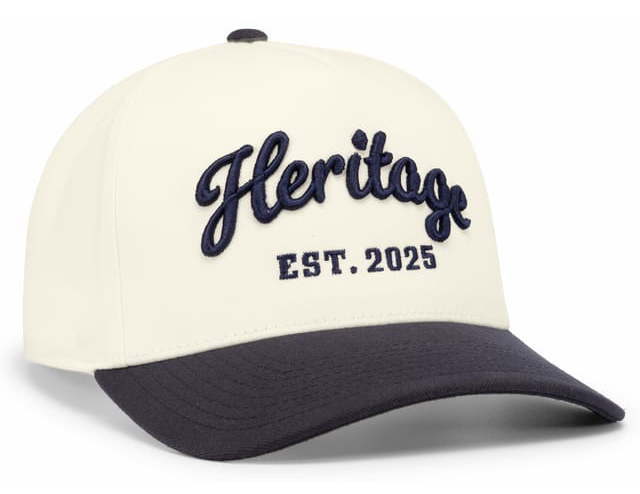 Ivory Pacific Headwear cap with navy brim and Heritage embroidery